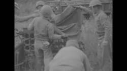 US soldiers conduct military training with rocket launchers during Korean War News Clip