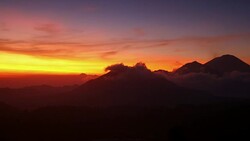 Moving clouds at sunrise in Kintamani in Bali Stock Footage