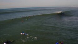 Soaring Over Surfers: Drone Captures Mavericks' Mighty Waves Stock Footage
