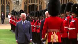 King Charles appears to usher Biden on after he loiters talking to soldier Instructional Video