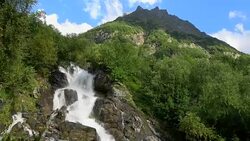 View waterfall scenes in mountains, national park Dombai, Caucasus, Russia Stock Footage