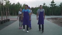 Gardeners are walking in the garden Stock Footage