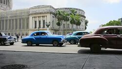 Havana, Cuba: Diversity of cars in front of the 'El Capitolio' building Stock Footage