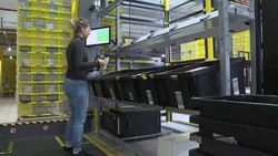 CLEAN : Robots and humans work side by side in Amazon's new French distribution centre News Clip