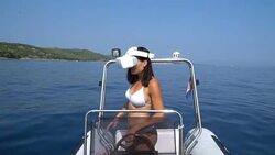 A woman with VR glasses on a boat Stock Footage