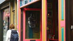 Sequence showing exteriors of the Cereal Killer Cafe in Brick Lane Stock Footage