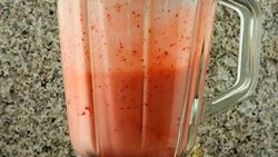 Preparation of cocktail in the blender from apples, bananas and strawberry.	Shooting in kitchen. Stock Footage