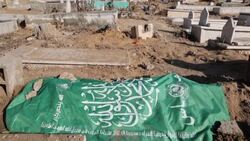 CLEAN : Palestinians visit graves of relatives on first day of Eid al-Fitr News Clip
