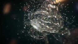 Spinning water and water droplets Stock Footage