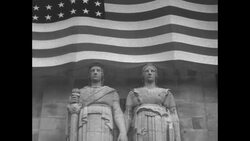 World War I sculptures and American flag on front of World War I Chateau-Thierry American Monument in Belleau, France News Clip