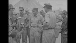 During Korean War, UN negotiators in Panmunjom, North Korea, on first anniversary of peace talks News Clip