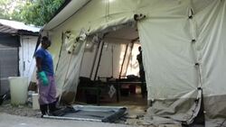 CLEAN : Haiti: People with cholera symptoms receive treatment at clinic News Clip