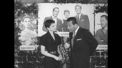 Actress Audrey Hepburn receives Oscar in New York City from William Holden (not at Oscar ceremonies) for her performance in movie "Roman Holiday" News Clip