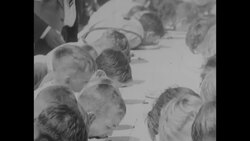 Kids compete in pie-eating contest as grown-ups look on and cheer News Clip