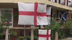 UK: England flags and bunting outside homes during The 2020 UEFA European Football Championship. News Clip