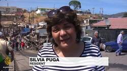 Helicopters in Chile douse fire that destroyed dozens of homes News Clip