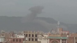 CLEAN : Smoke billows following an air strike on Yemen's Sanaa News Clip