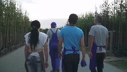 Gardeners are walking in the garden Stock Footage