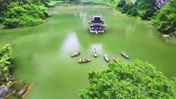 Explore Tràng An: Vietnam's Karst Kingdom Unveiled by Drone Stock Footage