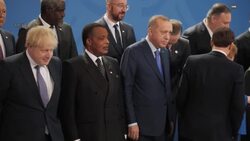 World leaders stand together for family photo at peace summit News Clip