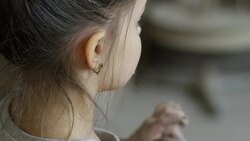 Adorable Little Girl Playing with Clay Stock Footage