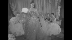 Models show evening dresses by Jacques Fath News Clip