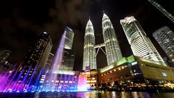 Colored night light twins towers time-lapse Stock Footage