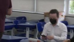 VOICED : Abren los centros de votación en Brasil para balotaje presidencial News Clip