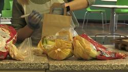 Volunteers prepare free lunches for children in Birmingham News Clip