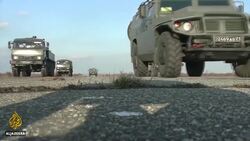 Merkel urges Putin to pull troops back from Ukraine border News Clip