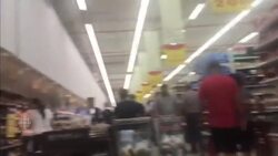 Residents in Doha, Qatar, hoard supplies and cash in shopping centre News Clip