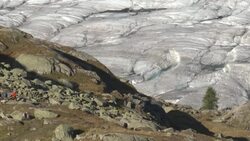 CLEAN : Melting Alpine glaciers yield archeologic troves, but clock ticking News Clip