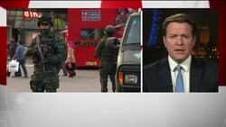 Beijing security warning for Westerners News Clip