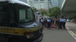 CLEAN : HK activist charged with secession, transported in police vehicle from court News Clip