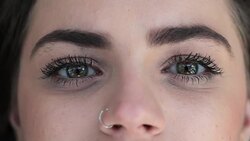 Dreamy Macro of green eyes opening and closing Stock Footage