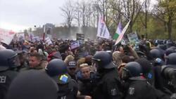 German Police Fire Water Cannons at Virus Protesters in Berlin News Clip