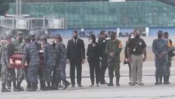CLEAN : Soldiers repatriate 18 coffins of Guatemalans killed in Mexico road crash News Clip