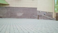 Close shot of female legs walking in heavy army boots. Closeup shooting fashionable female in leather boots walk in street on stone Stock Footage
