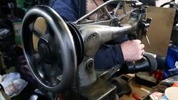 Shoemaker is repairing shoe Stock Footage