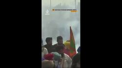 Riot police fire tear gas on farmers protesting in India News Clip