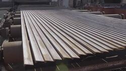 Steel corners on a rolling machine. Metal rolling. Stock Footage