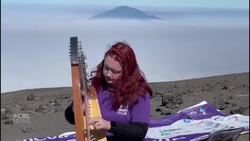 Musician plays the harp atop Mount Kilimanjaro News Clip