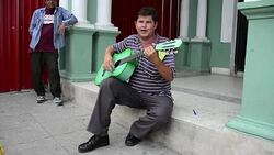 Santa Clara, Cuba: Popular Character Known as 'El Muneco' Stock Footage