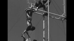 Aerialists Charles Couch, his wife, and their 3-1/2 year old daughter put on a high show in Worcester, MA News Clip