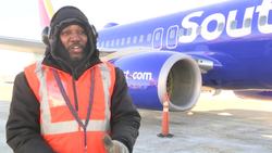 Airport worker stays positive in Midwest cold snap Instructional Video