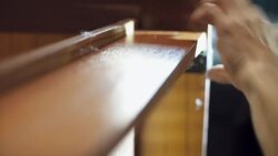 The man is repairing the home furniture Stock Footage