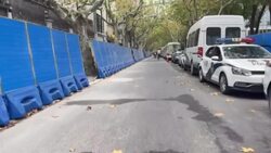 CLEAN : Police vehicles and fences in Shanghai's streets after protests News Clip