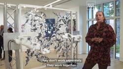 Take a look at Sougwen Chung’s mind-blowing artistic partnership with a telekinetic robot painter News Clip