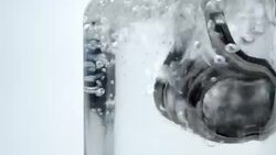 Boiling water with immersion heater Stock Footage