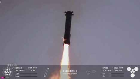 SpaceX mechanical arms catch Starship rocket booster on launch pad